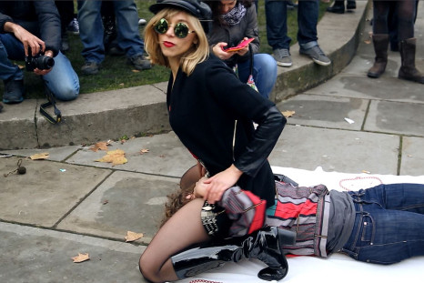Face-sitting porn demonstrators protest against censorship laws outside Parliament