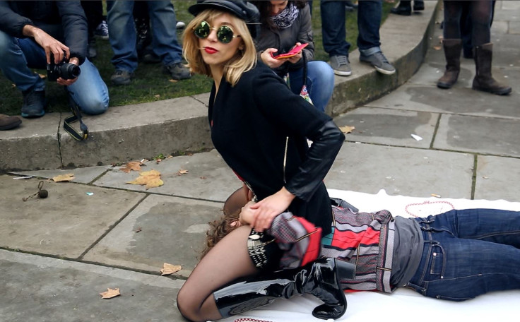 Face-sitting porn demonstrators protest against censorship laws outside Parliament