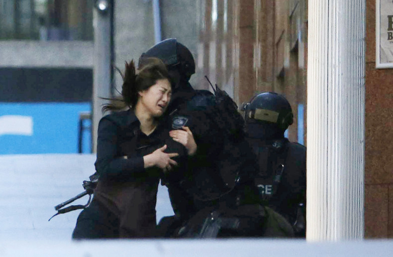 Sydney Seige: Hostages are seen fleeing Lindt Café