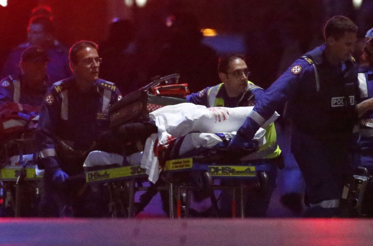 Sydney Siege: Police storm Lindt Cafe using live ammunition and end crisis