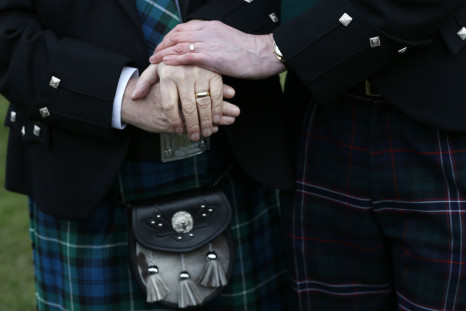 Larry Lamont and Jerry Slater (R) take part in a symbolic same-sex marriage outside the Scottish Parliament in Edinburgh, Scotland February 4, 2014. Scotland voted on Tuesday to allow same-sex marriages, becoming the 17th country to give the green light t