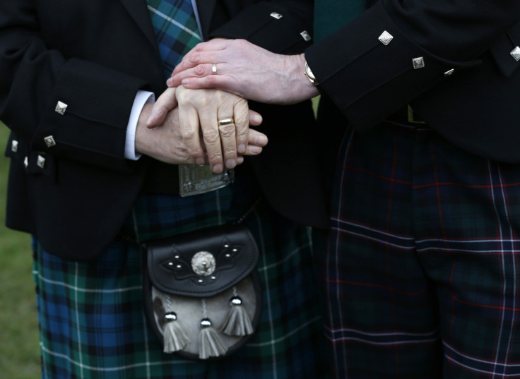 Larry Lamont and Jerry Slater (R) take part in a symbolic same-sex marriage outside the Scottish Parliament in Edinburgh, Scotland February 4, 2014. Scotland voted on Tuesday to allow same-sex marriages, becoming the 17th country to give the green light t