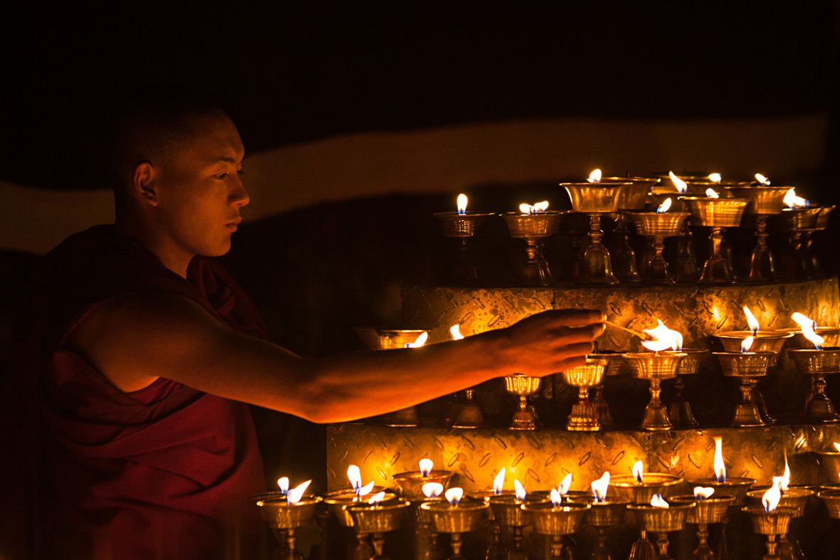 buddhist monk lamps