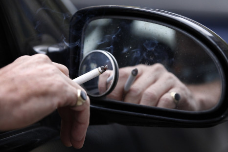 Man smoking in his car