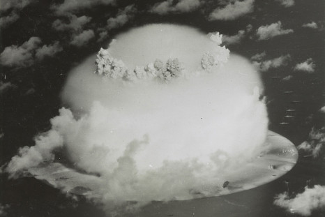 A mushroom cloud rises with ships below during Operation Crossroads nuclear weapons test on Bikini Atoll, Marshall Islands in this 1946 handout provided by the U.S. Library of Congress.