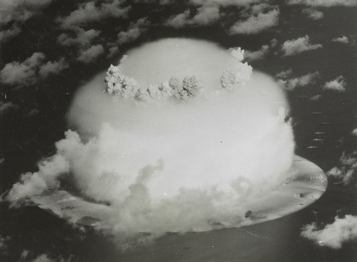 A mushroom cloud rises with ships below during Operation Crossroads nuclear weapons test on Bikini Atoll, Marshall Islands in this 1946 handout provided by the U.S. Library of Congress.