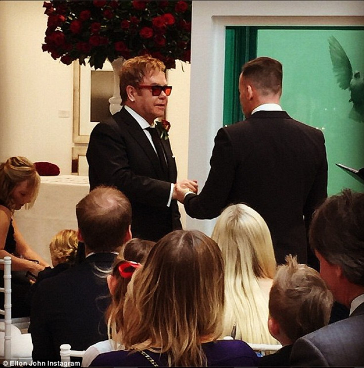 Sir Elton John and David Furnish exchange their wedding vows
