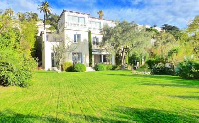 The villa is surrounded by gardens. (Fine and Country) The villa is surrounded by gardens. (Fine and Country)