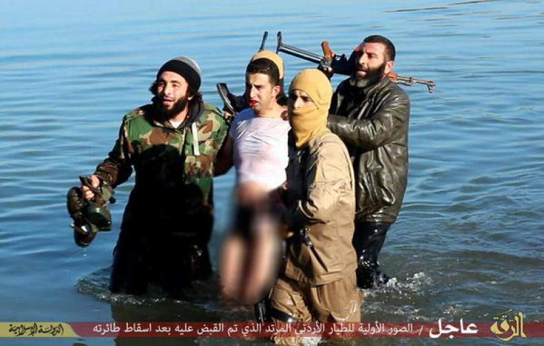 Pictures allegedly showing a Jordanian pilot being taken hostage by militants after his plane was shot down near Raqqa, Syria.