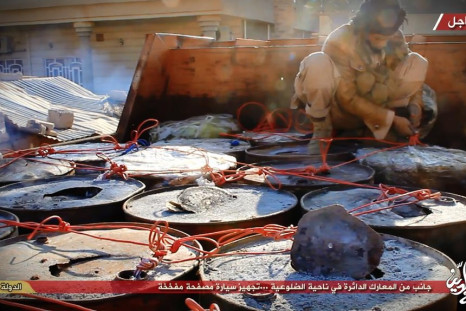 IS militants prepare a truck bomb for the Dhuluiya offensive