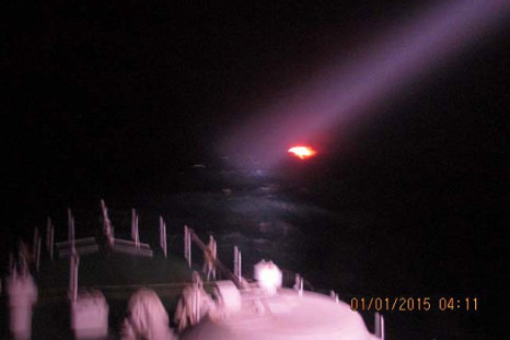 A handout photo released by India's Ministry of Defence is said to show a burning vessel off the coast of the western Indian state of Gujarat in the Arabian Sea early on Jan. 1