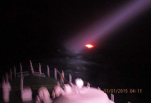 A handout photo released by India's Ministry of Defence is said to show a burning vessel off the coast of the western Indian state of Gujarat in the Arabian Sea early on Jan. 1