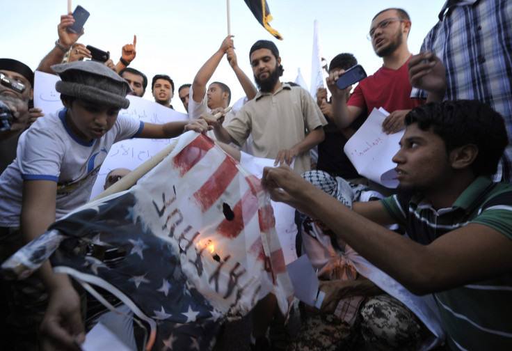 Libyan protesters burn American flag over al-Libi's arrest