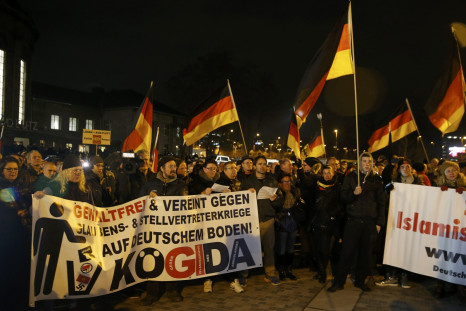 Germany plunges in darkness as rivals outnumber anti-Islam Pegida protesters