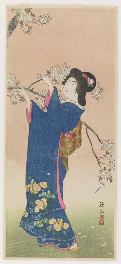 Woman and flowering cherry branch