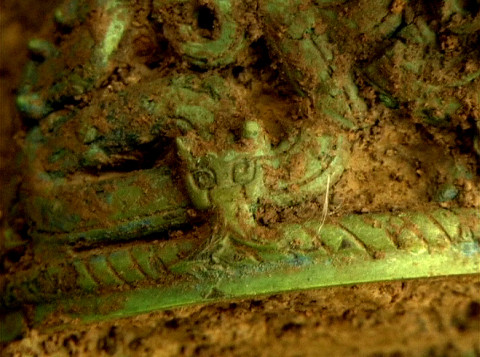 Close-up of the dragon on the pottery container unearthed from the tombs