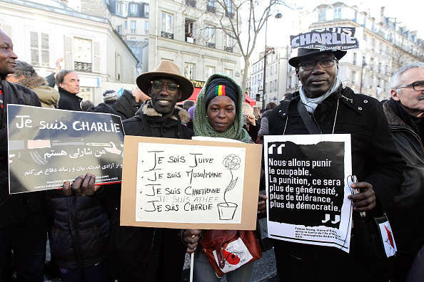 Charlie Hebdo Paris massacre: Jews and Muslims unite against terror in ...