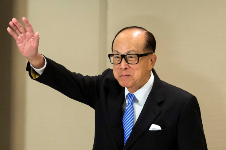 Shares in billionaire Li Ka-shing's firms surge on re-structuring plan
