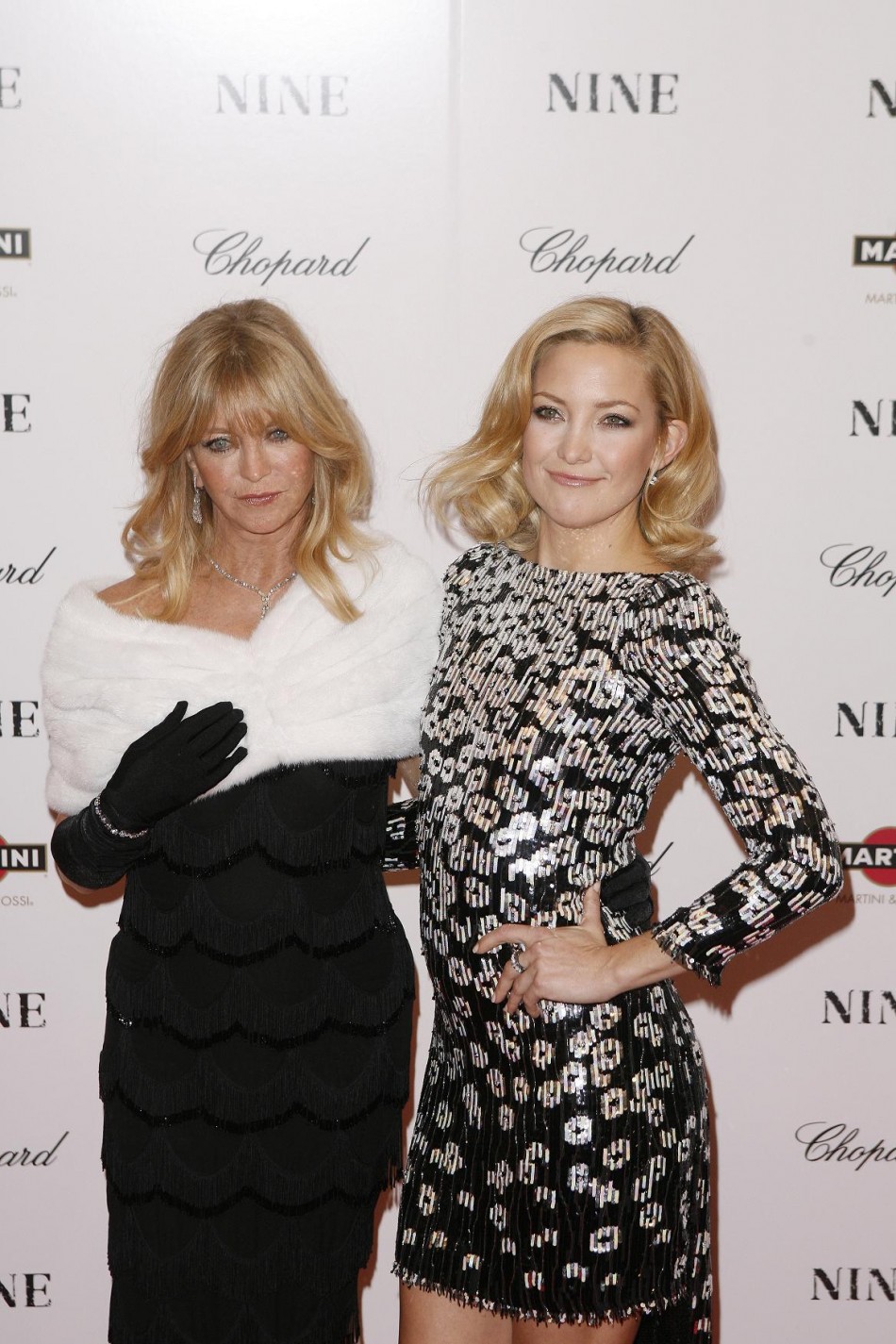 Cast member Kate Hudson arrives with her mother, Goldie Hawn, at the premiere of the film quotNinequot in New York.