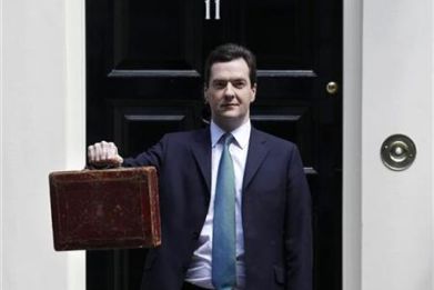 Chancellor George Osborne holds Gladstone&#039;s old Budget box for the cameras outside 11 Downing Street