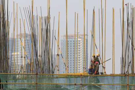 China's economy expands at 7.4% in 2014, slowest pace in 24 years