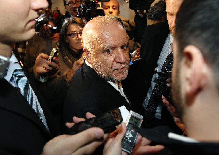 Iranian Oil Minister Bijan Zanganeh is surrounded by journalists and security staff as he arrives at his hotel ahead of an OPEC meeting in Vienna December 3, 2013.
