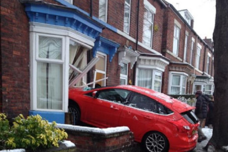 car crashes into home in Sheffield
