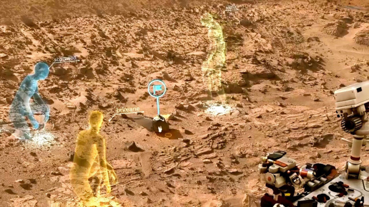 A screengrab of OnSight, showing scientists "meeting" virtually to discuss rover operations