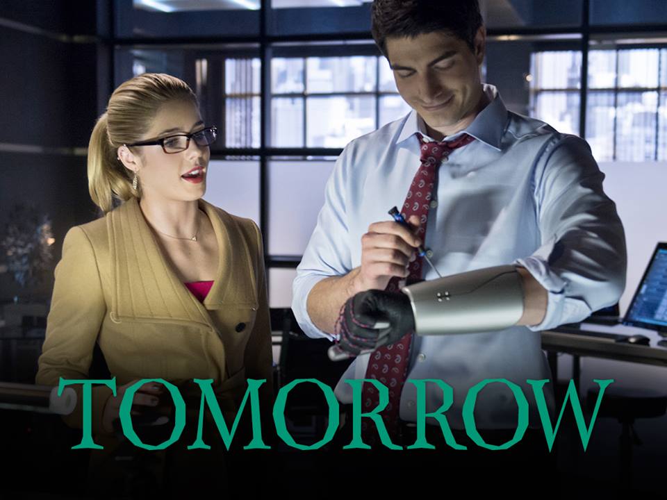 Arrow's Felicity and Ray Palmer in The Flash Arrow's Felicity and Ray Palmer in The Flash