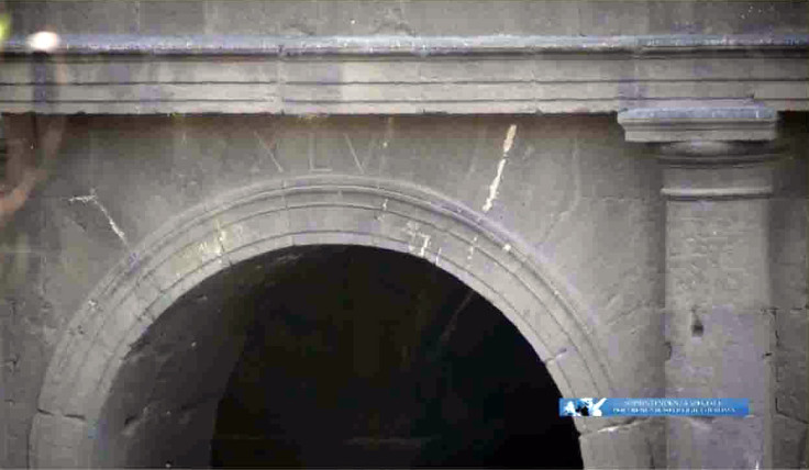 One of the arches in the Colosseum engraved with Roman numerals