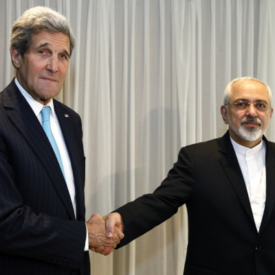 Iranian foreign minister summoned for walking with John Kerry