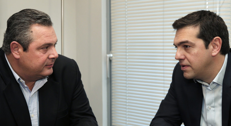 Head of radical leftist Syriza party Alexis Tsipras (R) meets with leader of right-wing, anti-bailout Independent Greeks party Panos Kammenos