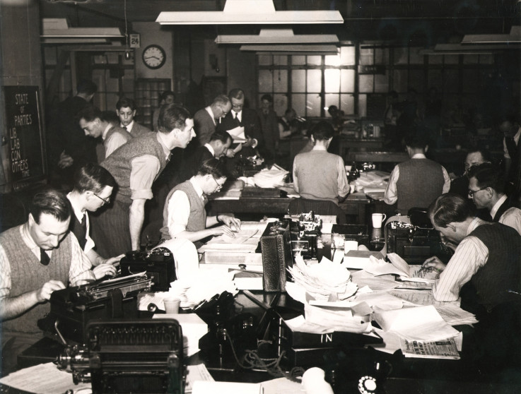 A file photo from the Reuters archive shows journalists in the Reuters Newsroom at 85 Fleet Street, London, during the British General Election of 1950