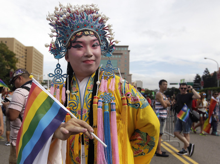 A man dressed in a Chinese opera costume takes part in the Taiwan LGBT Pride Parade