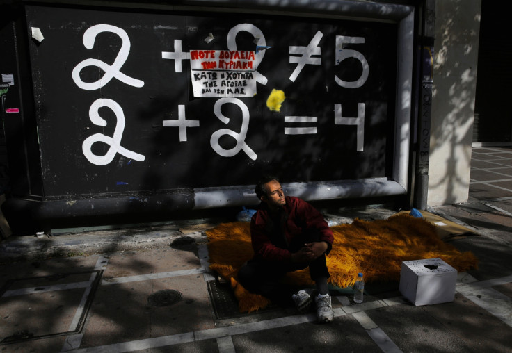 Yiorgos, a 40-year-old who became homeless in 2010 after his grocery shop went out of business, sleeps outdoors in central Athens February 3, 2013.