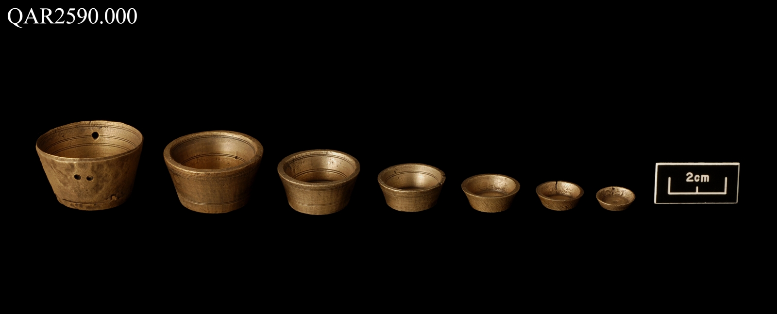 Two sets of nesting weights, which can be stored compactly by placing one inside the other, have been found on Queen Anne's Revenge Two sets of nesting weights, which can be stored compactly by placing one inside the other, have been found on Queen Anne's Revenge