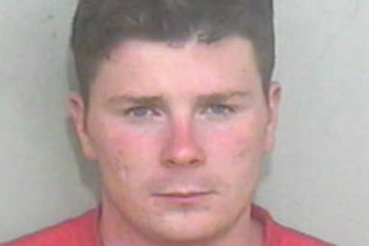 Michael Cawley is wanted by police after caravan was rammed on Essex traveller site