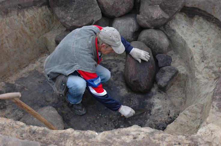 An archaeologist excavating one of the "princely" tombs found at the necropolis