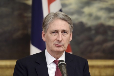 British Foreign Secretary Philip Hammond pauses as he speaks during a meeting with Finnish Foreign Minister Erkki Tuomioja (not pictured) in Helsinki, January 8, 2015