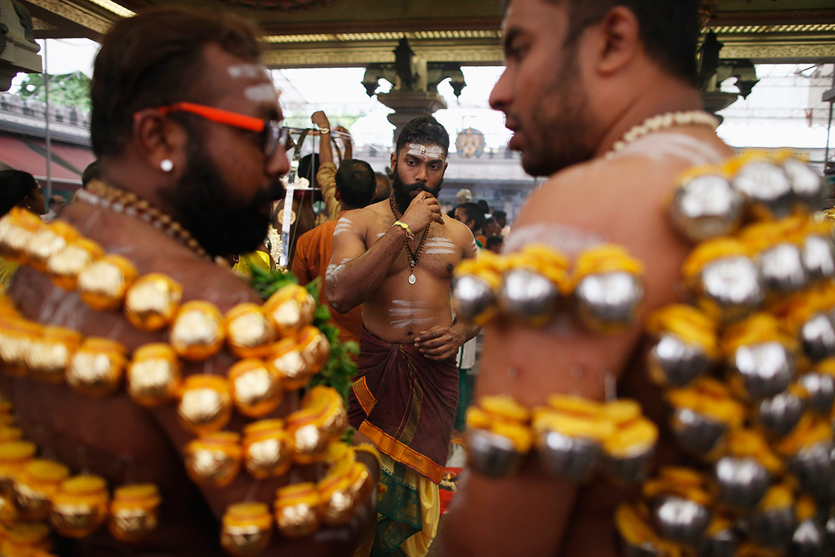 Thaipusam Festival: Hindus with facial and body piercings ...