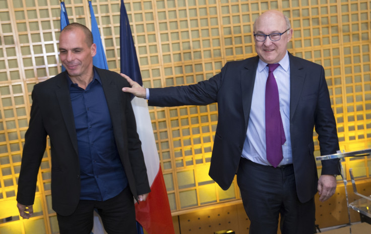 French Finance Minister Michel Sapin  and Greek Finance Minister Yanis Varoufakis