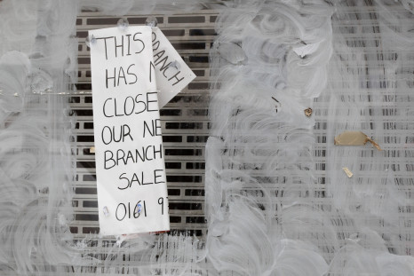 A notice is displayed in the window of an empty shop in Altrincham, northern England,