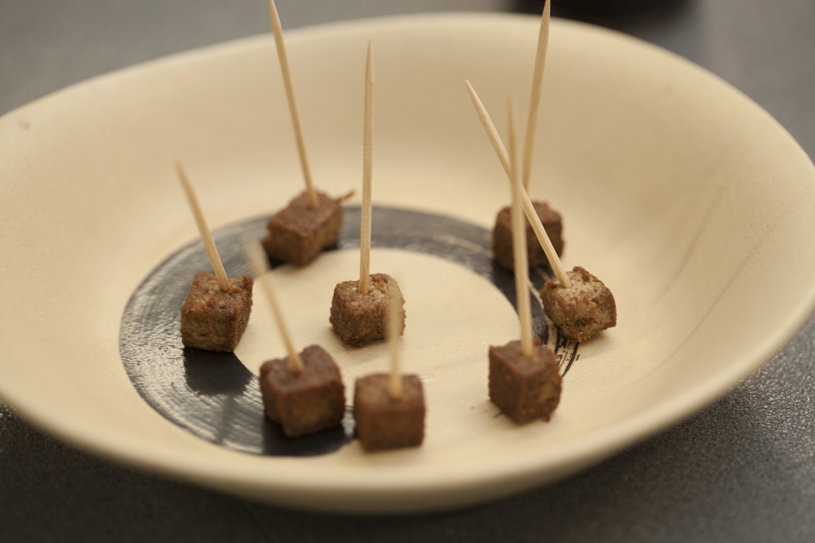 Pieces of C-fu on a plate at a tasting session. The product can be fried, boiled, baked, dipped, grilled, fermented, salted or dried Pieces of C-fu on a plate at a tasting session. The product can be fried, boiled, baked, dipped, grilled, fermented, salted or dried