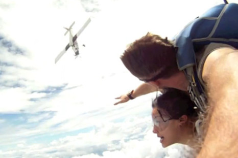 Video: Skydivers narrowly miss plane's propellers during freefall