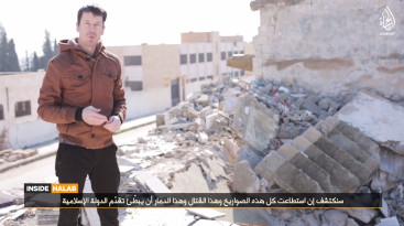 British hostage John Cantlie appears in an Isis video recorded in Aleppo, Syria. British hostage John Cantlie appears in an Isis video recorded in Aleppo, Syria.