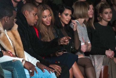 Kim K, Jay-Z and P. Diddy watch as Kanye West unveils Yeezy clothing line