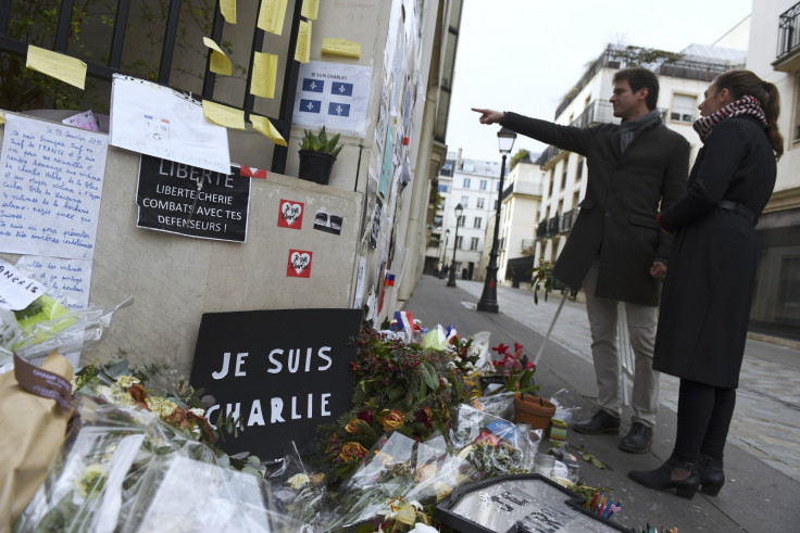 Flowers and tributes laid outside the offices of French satirical magazine Charlie Hebdo, the day after a deadly attack on a freedom of speech debate in Copenhagen. (Getty)
