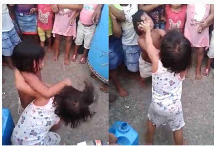 The viral video shows mothers encouraging two young girls to fight savagely