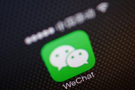 A picture illustration shows a WeChat app icon in Beijing