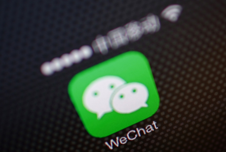 A picture illustration shows a WeChat app icon in Beijing